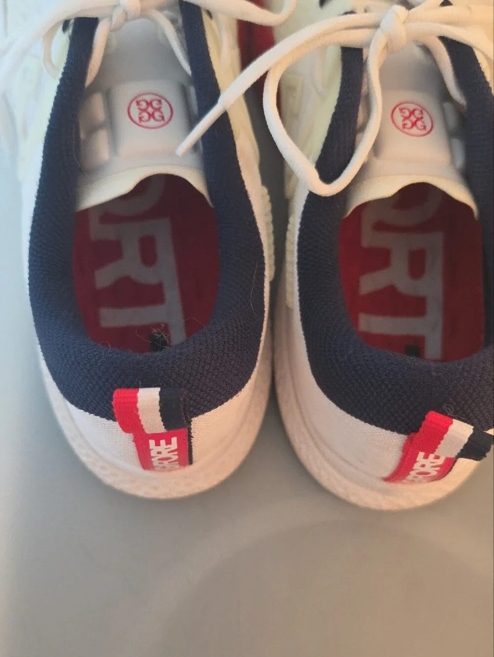 G/FORE  Pickleball Racquet White Sneakers with Navy and Red Accents